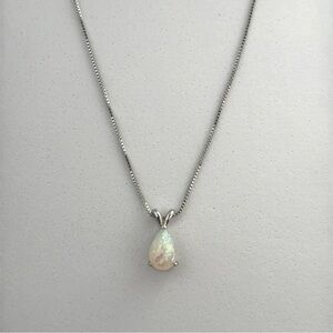 Elegant Silver Necklace with Opalescent Pendant